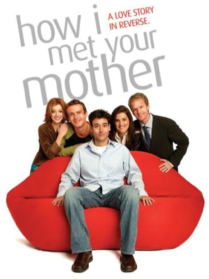 Cast of a beloved comedy show posing on a red couch, with a title above them.