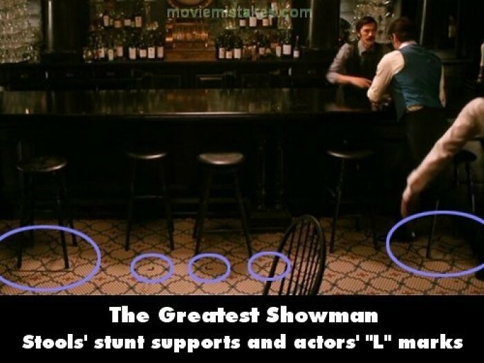 Bar scene from "The Greatest Showman" showing funny movie mistakes with visible stunt and actor marks.