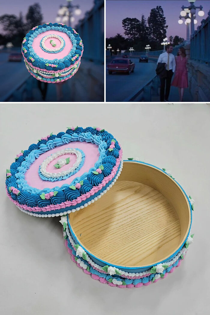 Artistic cake-shaped storage box inspired by a romantic movie scene, featuring intricate blue and pink decorations.