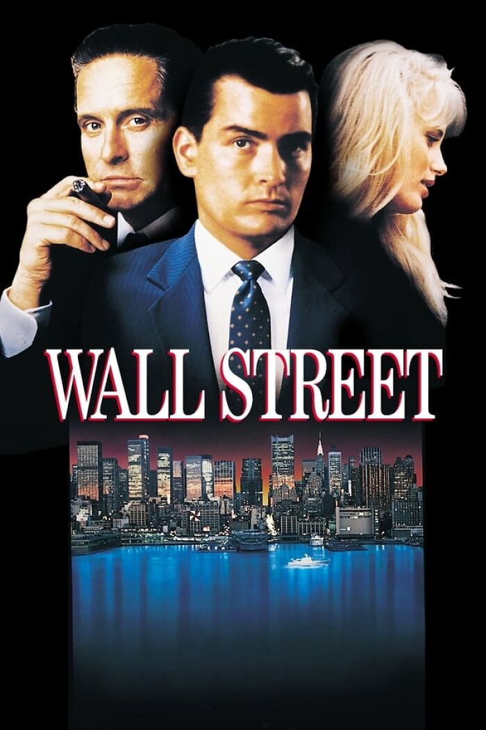 Wall Street movie poster with city skyline; classic example of nostalgia films.