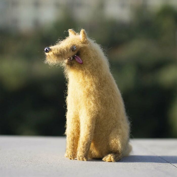 Funny-looking animal doll with a long snout and fuzzy fur, representing strange art by a Georgian artist.