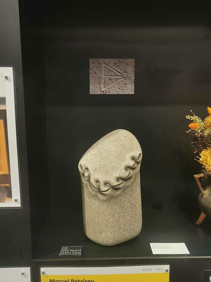 Stone sculpture bending fluidly, showcasing art that defies physics.