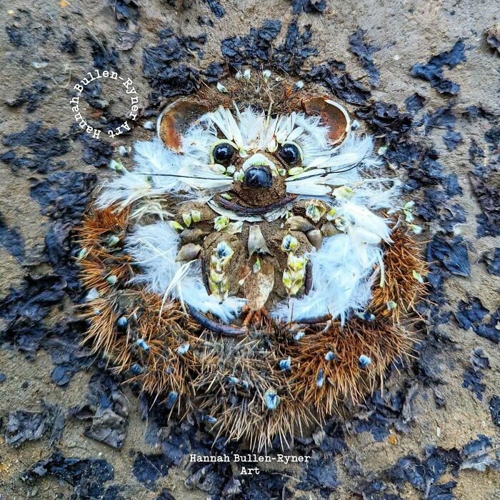 Animal portrait made from natural materials, featuring a mouse crafted with leaves, seeds, and feathers on earthy background.