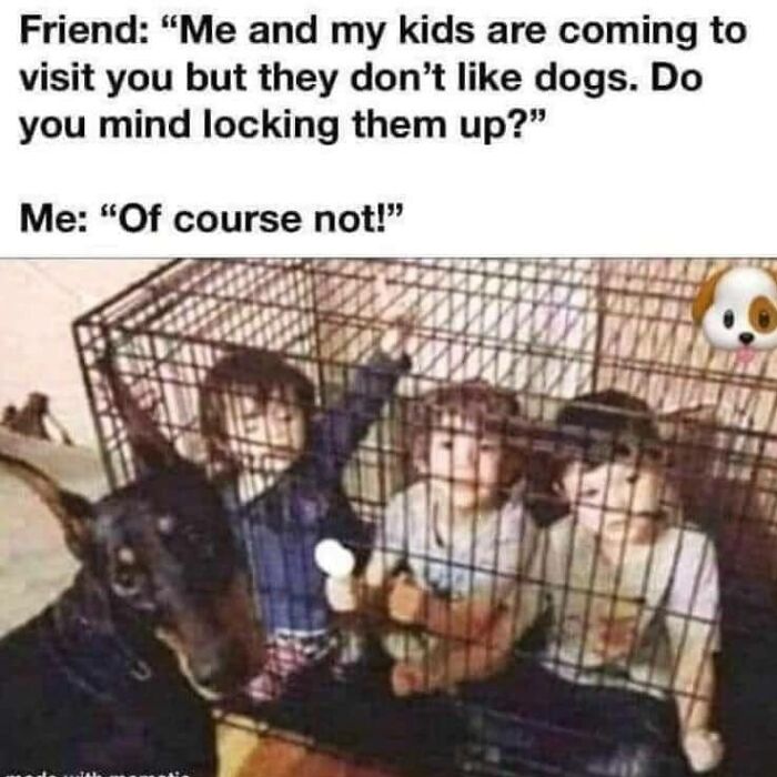 Kids humorously sitting in a dog crate with a Doberman outside, showcasing a funny and relatable moment for dog owners.