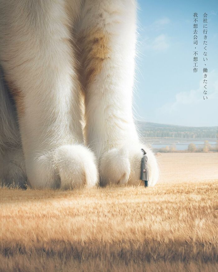 Giant cat paws towering over a field with a person standing beside, imagined by artist Xiang.