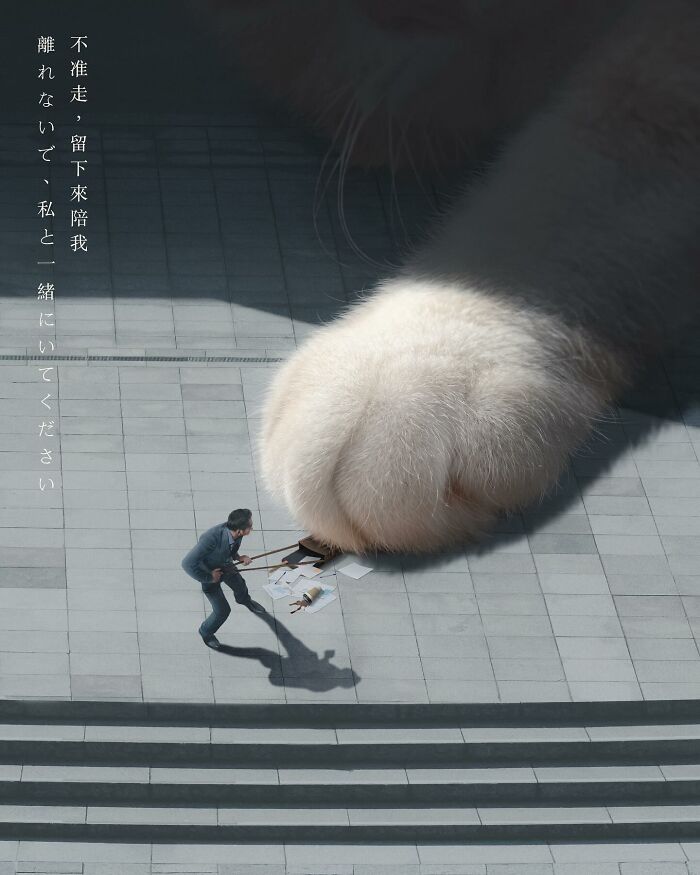 Giant cat paw towering over a man on stone steps with scattered papers.