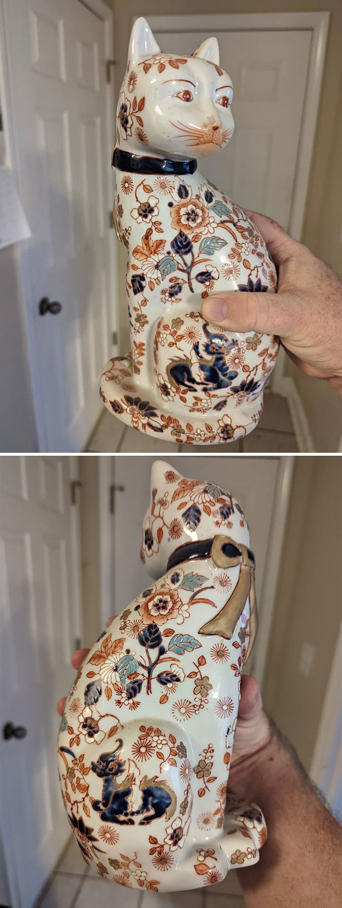 Ceramic cat with floral designs, a unique secondhand find, held in a hand.