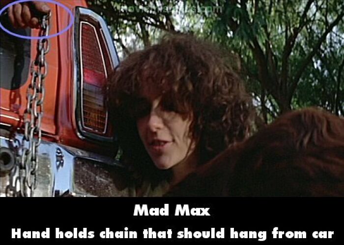 Hand holding a chain mistakenly in a scene from Mad Max, highlighting funny movie mistakes.