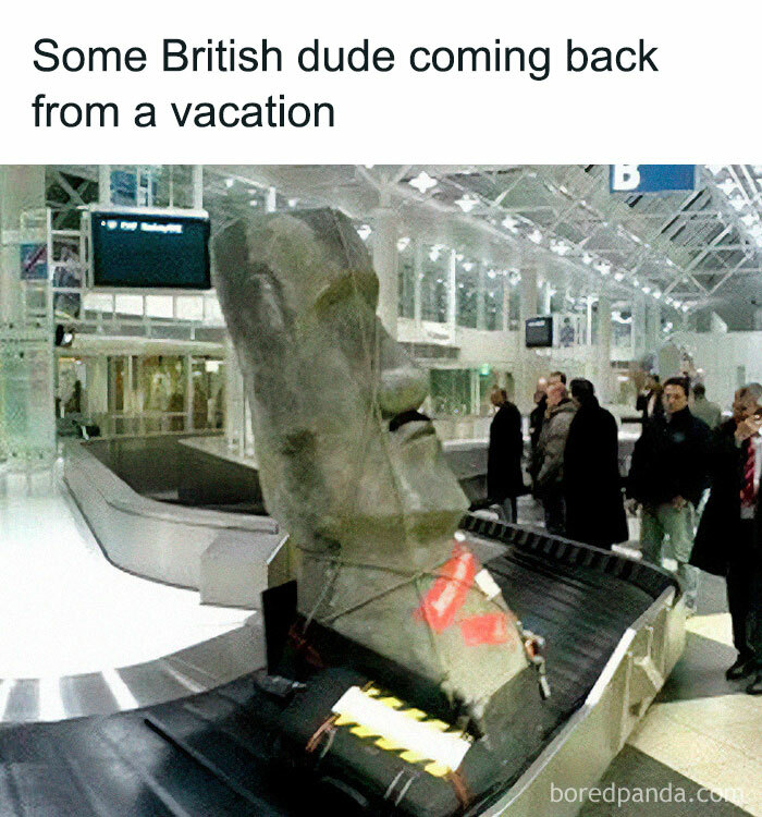 Moai statue on airport luggage carousel with passengers amused, depicting a historical meme.