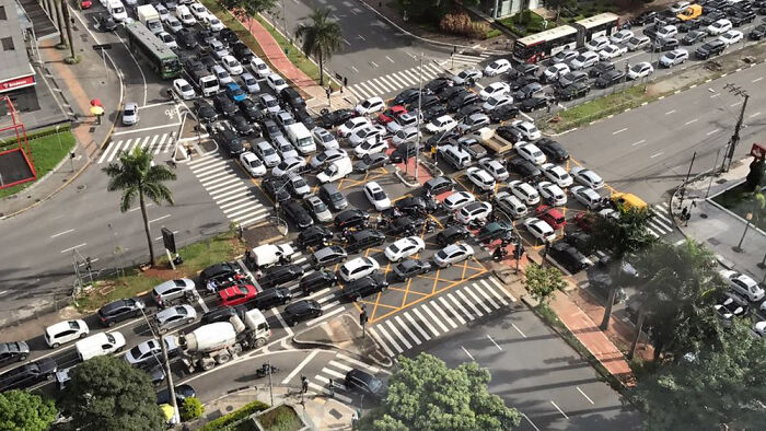 Urban hell: an aerial view of an extreme traffic jam at a busy intersection.