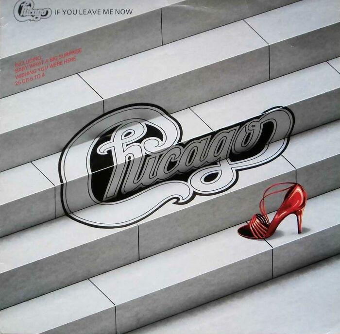 Chicago band logo on a staircase, featuring a red high heel, represents iconic '70s music nostalgia.