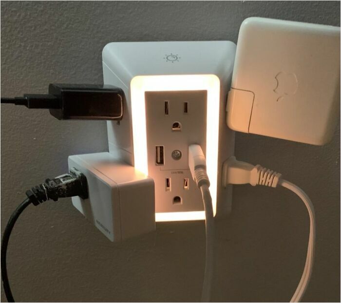 Outlet extender with multiple chargers and night light, showing a small upgrade for convenience.