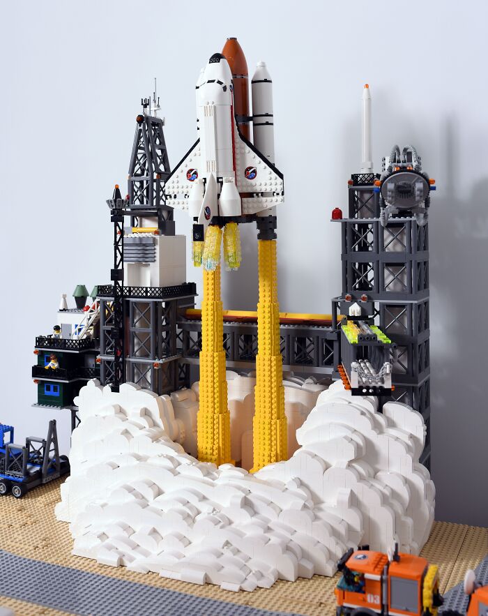 LEGO space shuttle build launching from a detailed pad in a cool LEGO display.