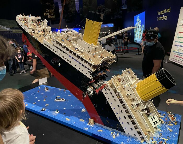 LEGO Titanic model displayed at an exhibition, showcasing detailed construction and craftsmanship.