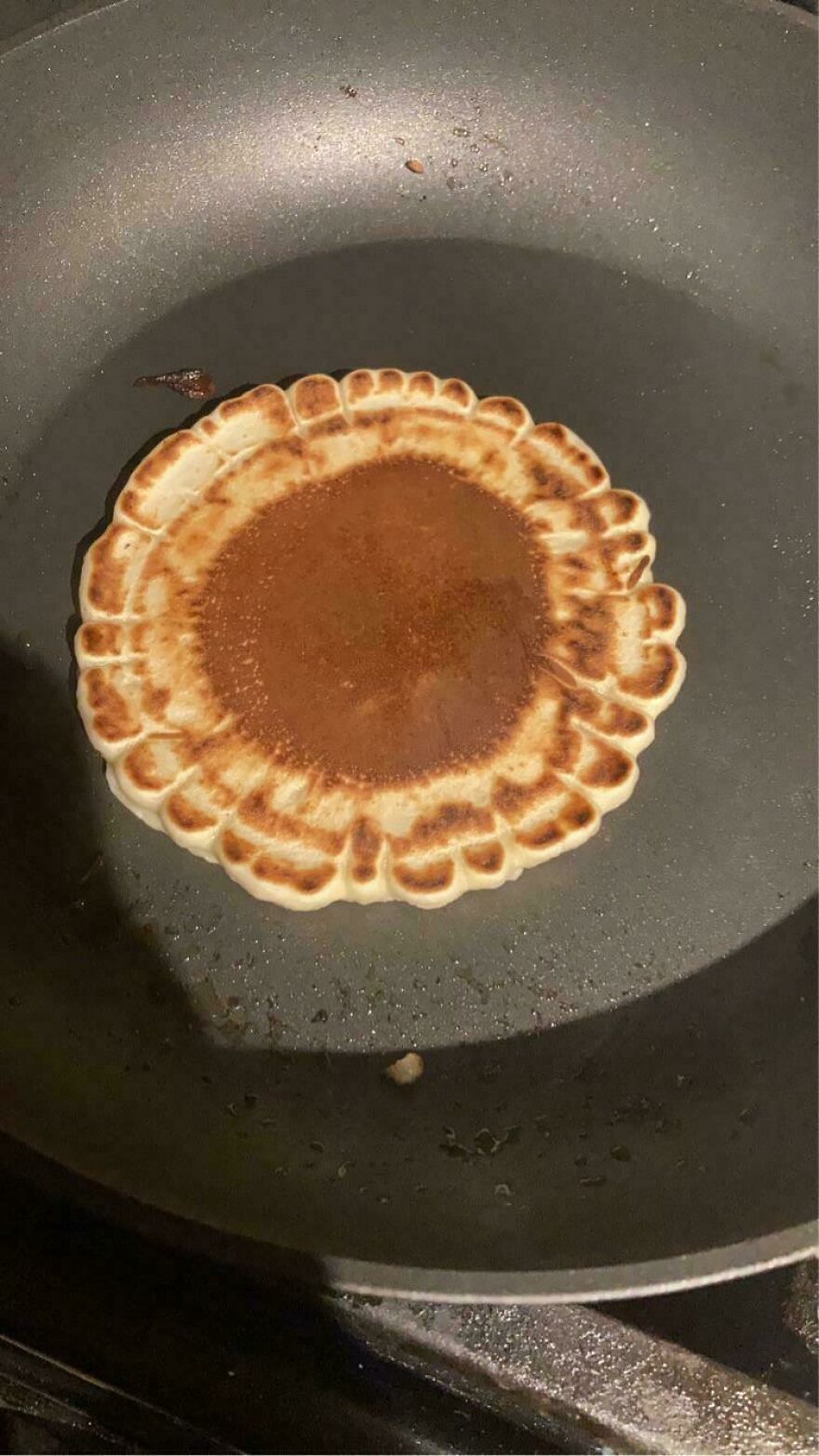 Pancake in a pan shaped like a sunflower, showcasing things that look like other things.