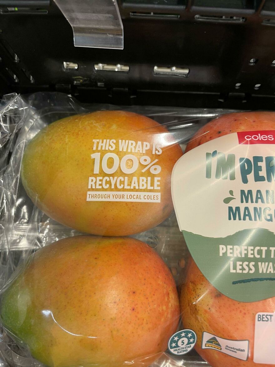 Packaged mangoes with recyclable wrap, highlighting wasteful unnecessary packaging in stores.