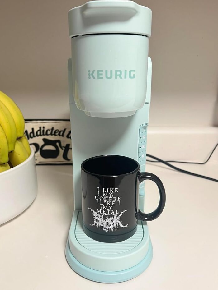 Keurig coffee maker with a black mug, showcasing one of the biggest discounts on Amazon Winter Deals.