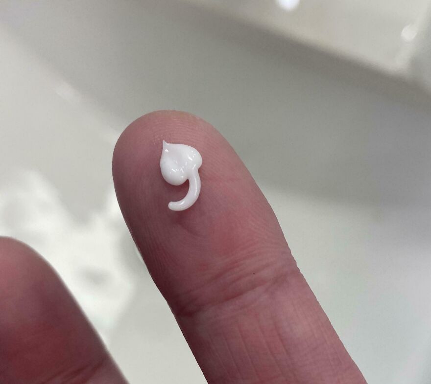 Cream on fingertip shaped like a musical note, highlighting things that look like other things.