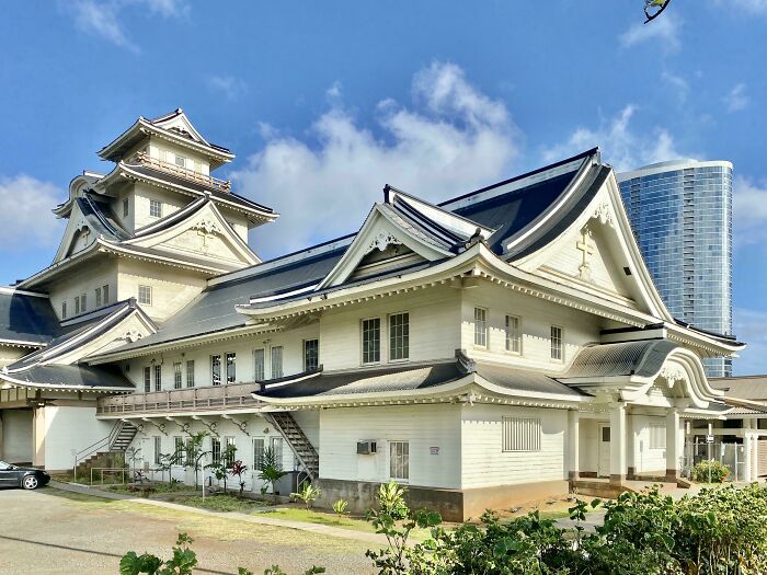 Japanese-style church building under a blue sky, showcasing architectural beauty in fascinating church photos.