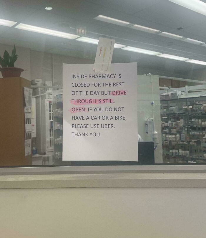 Sign in pharmacy indicating closure with suggestion to use Uber, highlighting issues with local pharmacies.