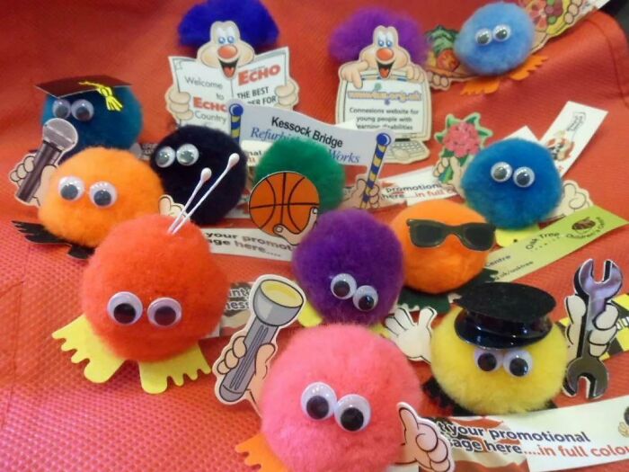 Pom pom creatures with googly eyes and retro accessories, epitomizing 80s nostalgia pictures.