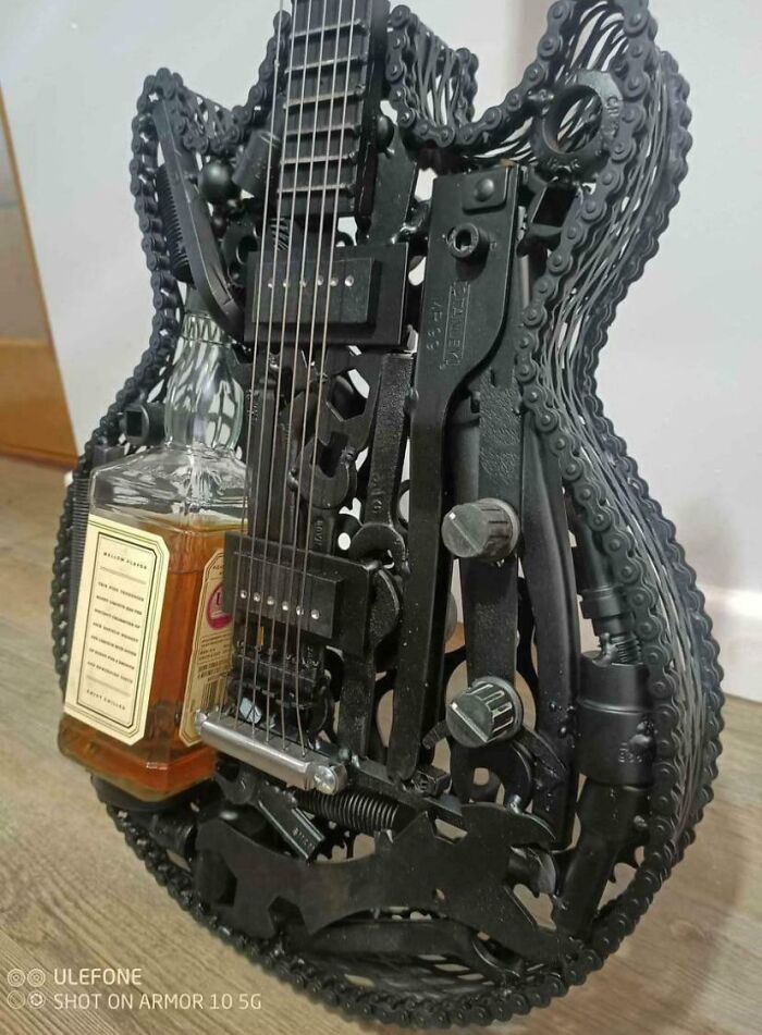 Spotted On Marketplace. Think This Qualifies? Electric Guitar Made Of Bike Parts That Houses A Bottle Of Jd