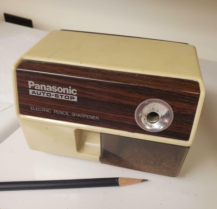 80s nostalgia: vintage Panasonic electric pencil sharpener with pencil.