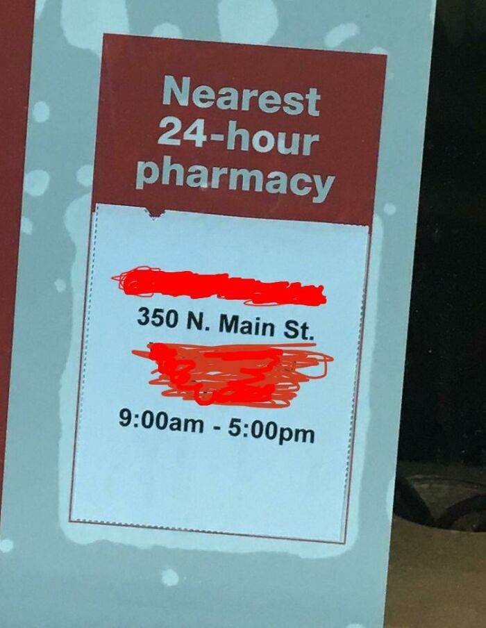 Sign showing a local pharmacy at 350 N. Main St with limited hours, contradicting the 24-hour claim.