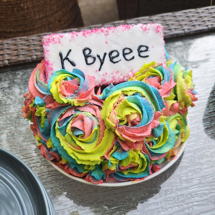 Colorful cupcake with "K Byeee" icing, symbolizing people quitting jobs in a fun, whimsical way.