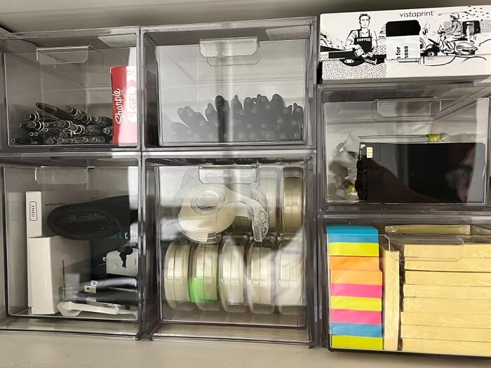 Organized office supplies in clear containers for a responsible start to the New Year.