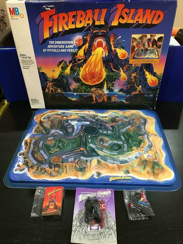 Fireball Island board game with box art and pieces, capturing 80s nostalgia.