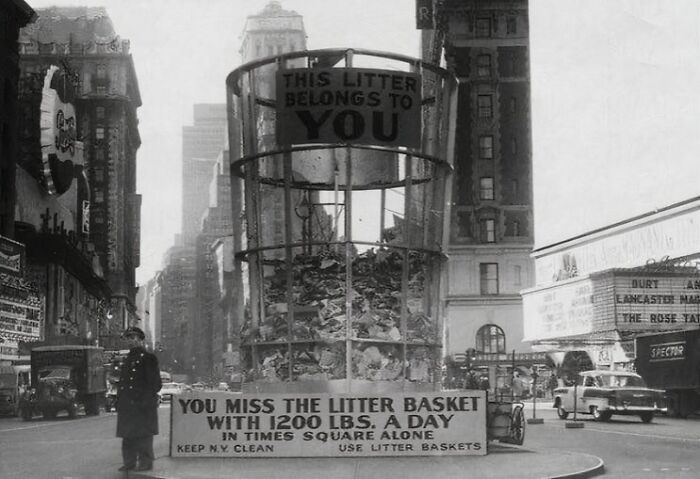 Historical pic of Times Square with large litter display, highlighting waste issues in the 1940s.