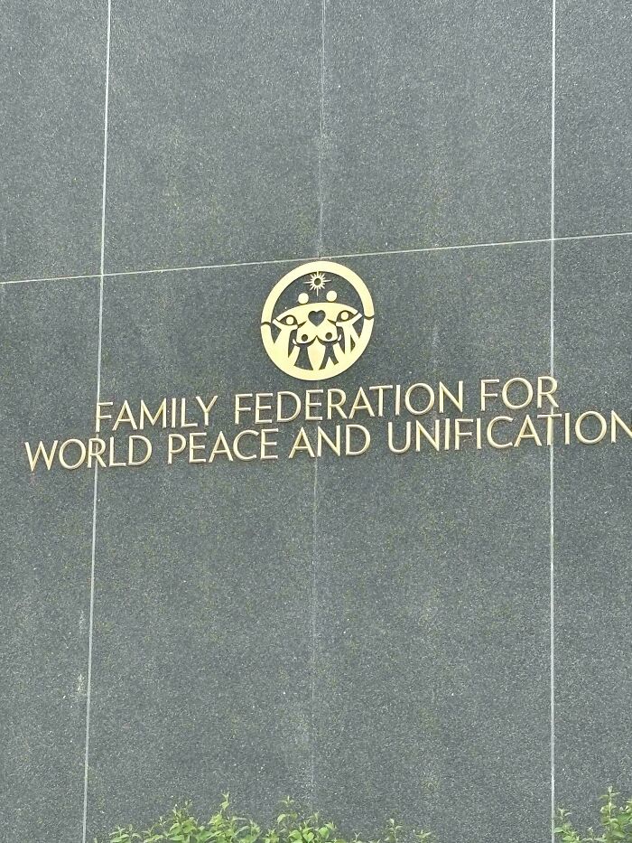 Logo For The Family Federation For World Peace And Unification Found Across The Street From My Apartment Appears To Contain B***s