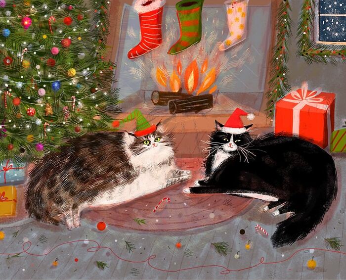 Cozy cat illustration by Jamie Shelman, featuring two festive cats near a decorated Christmas tree and fireplace.