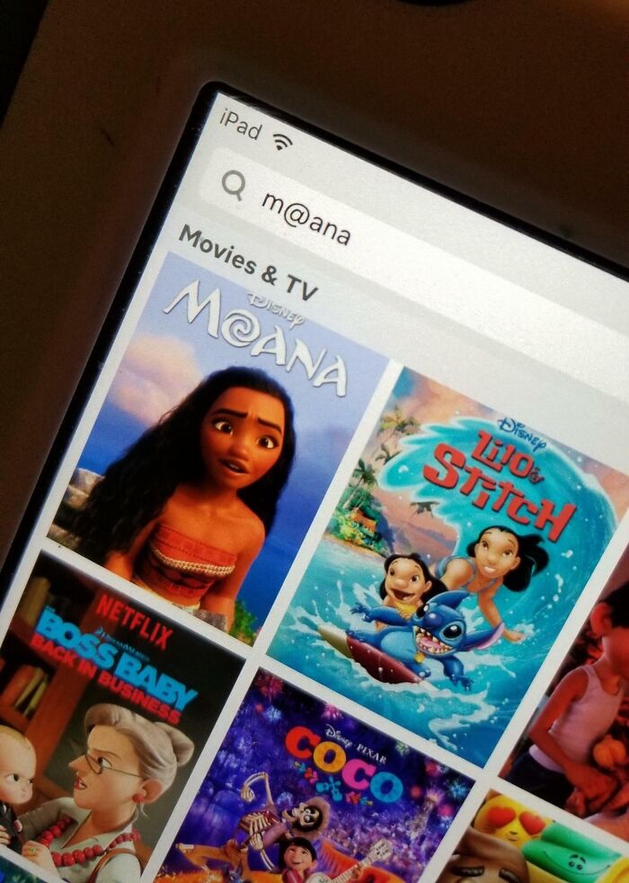 iPad screen search for Moana shows kids' movies, including Coco and Lilo & Stitch, creating a hilarious-kids moment.