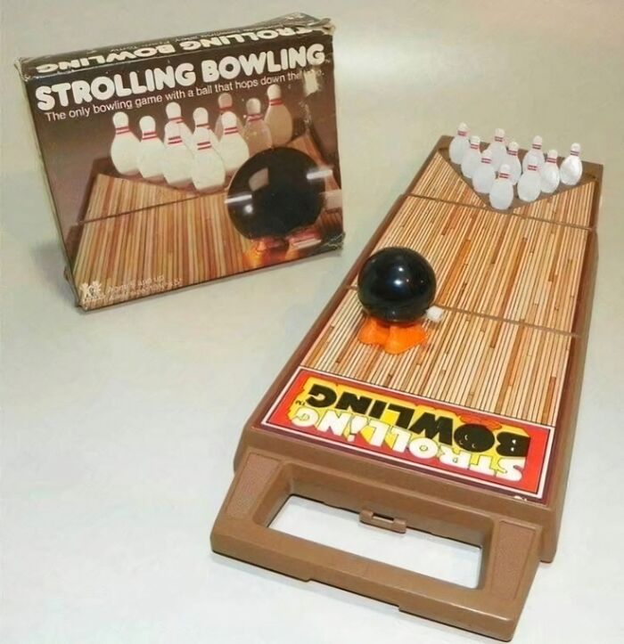 Gen X funny toy: vintage Strolling Bowling game with a mini bowling lane and box in the background.