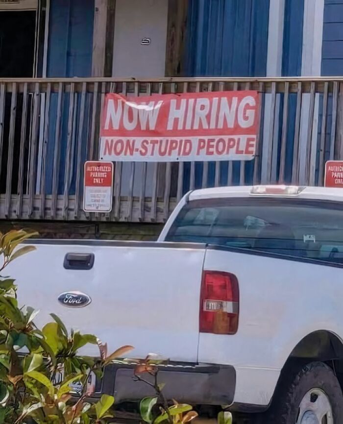 Hiring sign humor for Gen X on a porch with a white truck in the foreground.