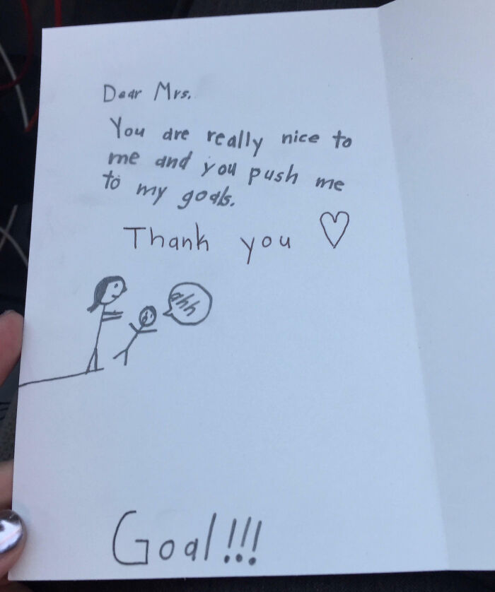 Child's funny drawing and note thanking a teacher for pushing them to their "goals", with humorous stick figures.