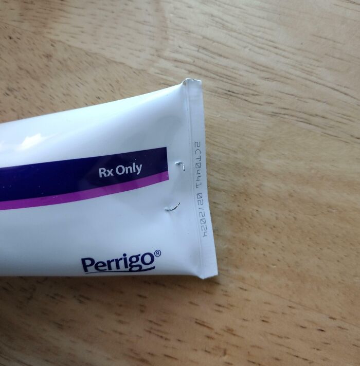 Perrigo tube with "Rx Only" label, highlighting local pharmacies' issues with packaging.