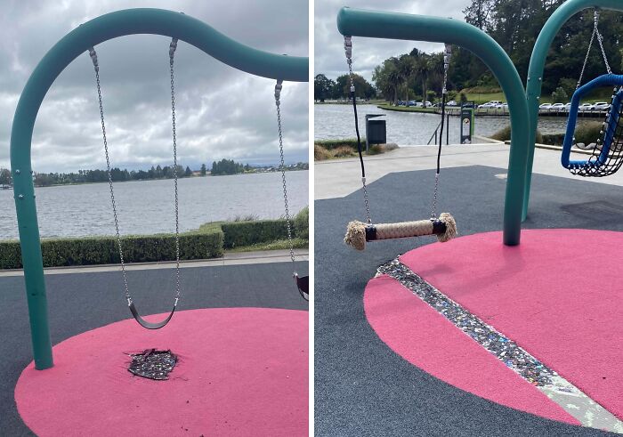 Worn-down swings with chains and frayed seats illustrate the passage of time in a park by the water.