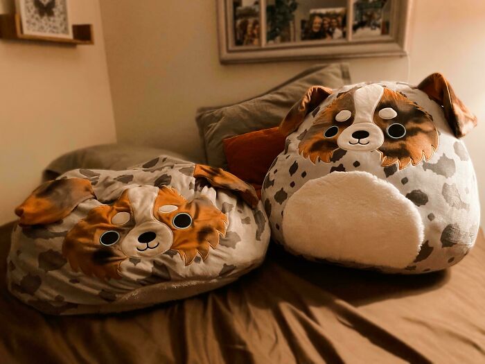 Worn-down plush toys illustrating time's effect, with flattened shapes on a bed.