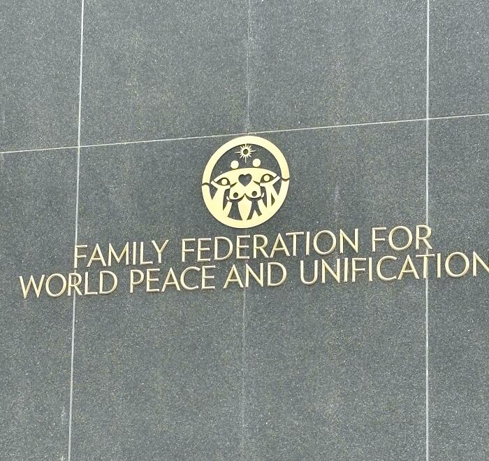 Logo For The Family Federation For World Peace And Unification Found Across The Street From My Apartment Appears To Contain B***s