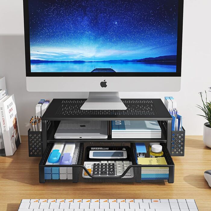 Desk organizer with computer monitor and office supplies, showcasing hottest new Amazon releases.