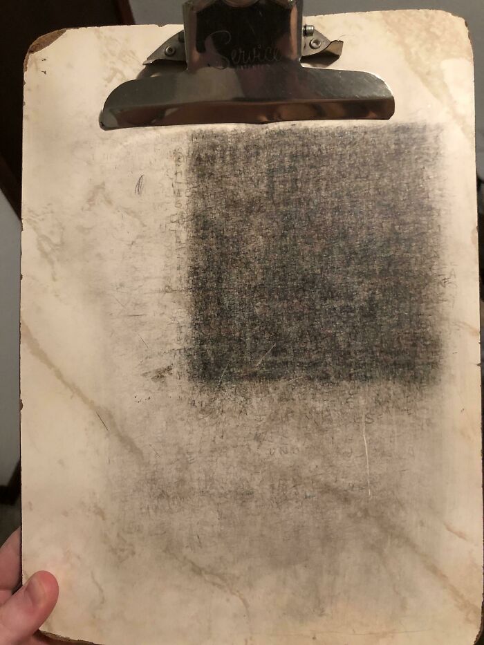 Worn-down clipboard showing effects of time, with faded surface and visible wear, illustrating how time works.