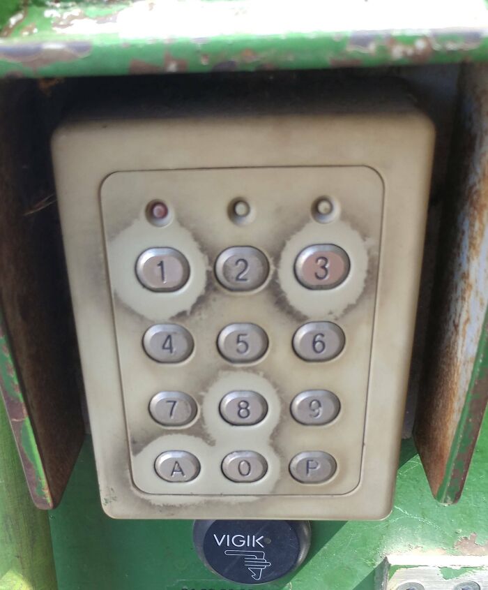 Worn-down keypad showing signs of wear and tear over time, illustrating how objects age.