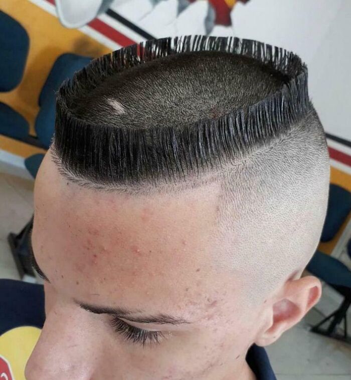 Unusual haircut with a flat top and shaved sides, exemplifying a tragic hair accident from an online group.