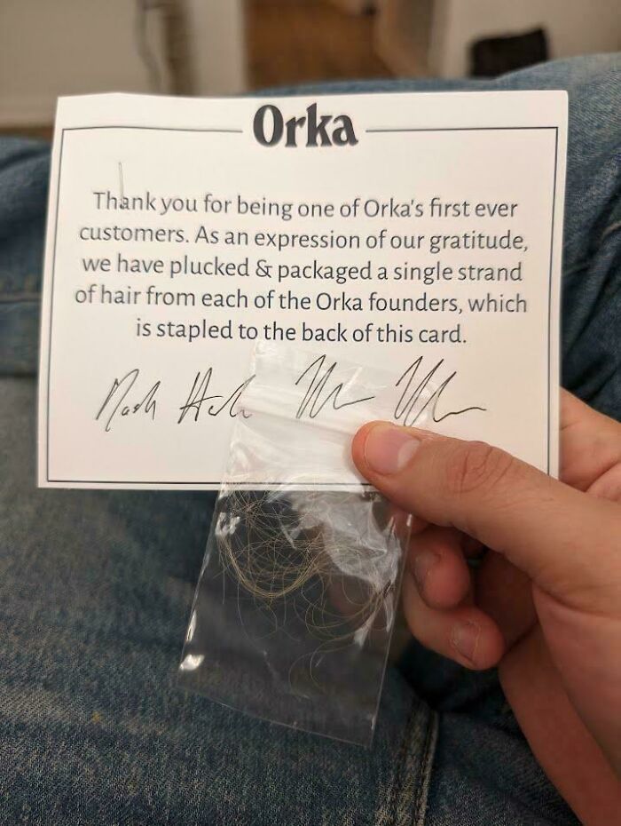 Card from Orka with founder's hair in a small bag, showcasing cool product surprises.