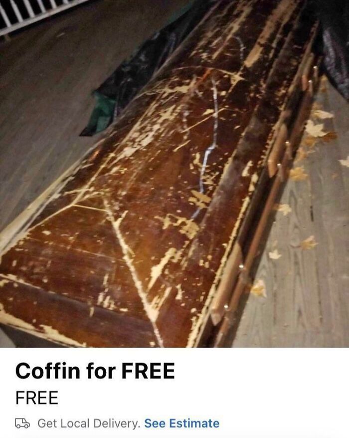 Worn wooden coffin available for free delivery, showcasing bizarre items to sell online.