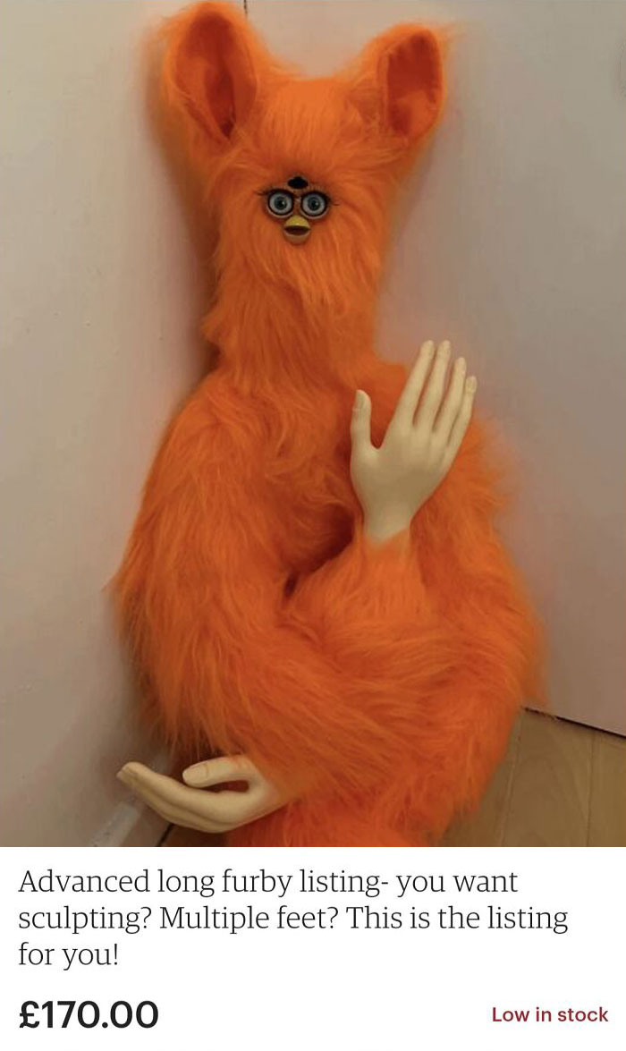 Orange furry sculpture with human-like hands, a quirky item from creepy things sell online.