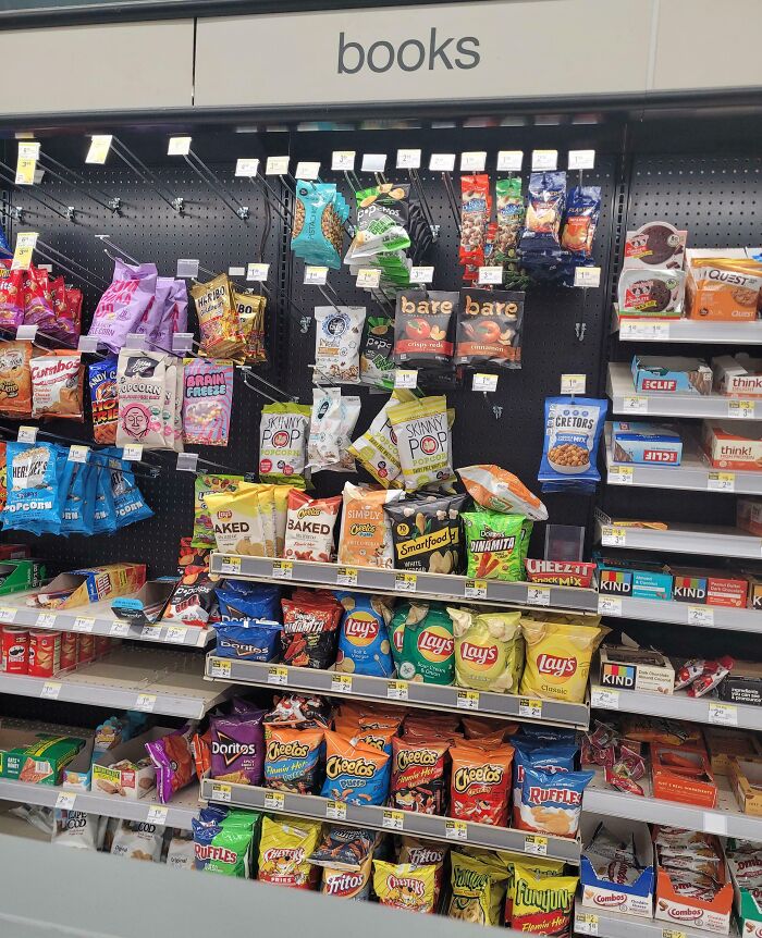 Snack section mistakenly labeled as books, illustrating unfortunate public interior design.